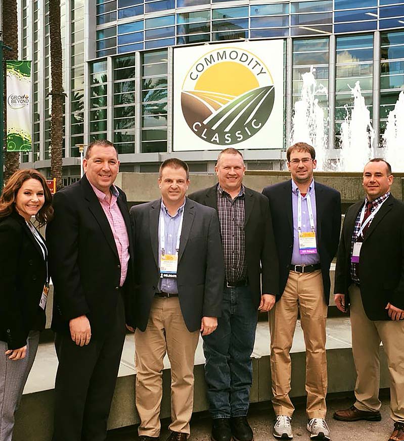 New York Corn and Soybean Growers Association staff and delegates attending the 2018 Commodity Classic in Anaheim, California. From the left, Executive Director Colleen Klein, Director of Public Policy Dean Norton, and New York delegates Jason Swede, Tom Corcoran, Seth Pritchard and Brad Macauley.