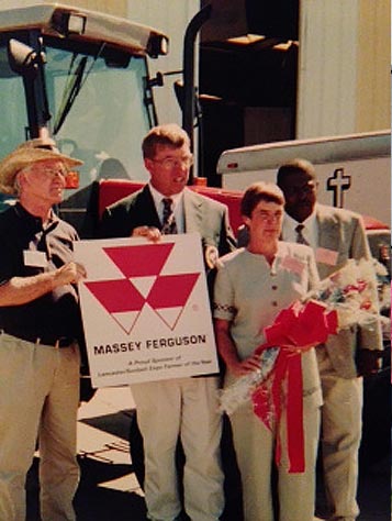 Willard (second from left) and Laura Lee Jack (third from left) accepting an award for “Southeastern Farmer of the Year” in 2001.